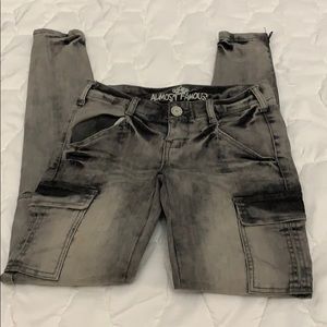 Gray and black skinny jeans